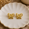 Golden Bow Statement Studs