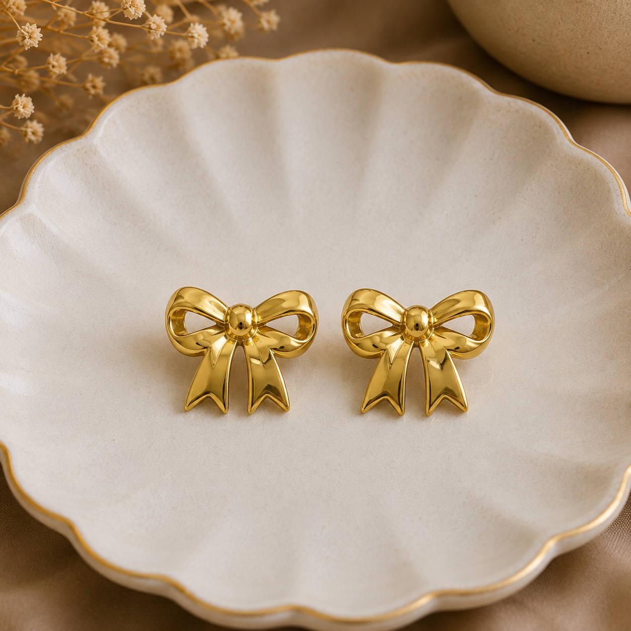 Golden Bow Statement Studs